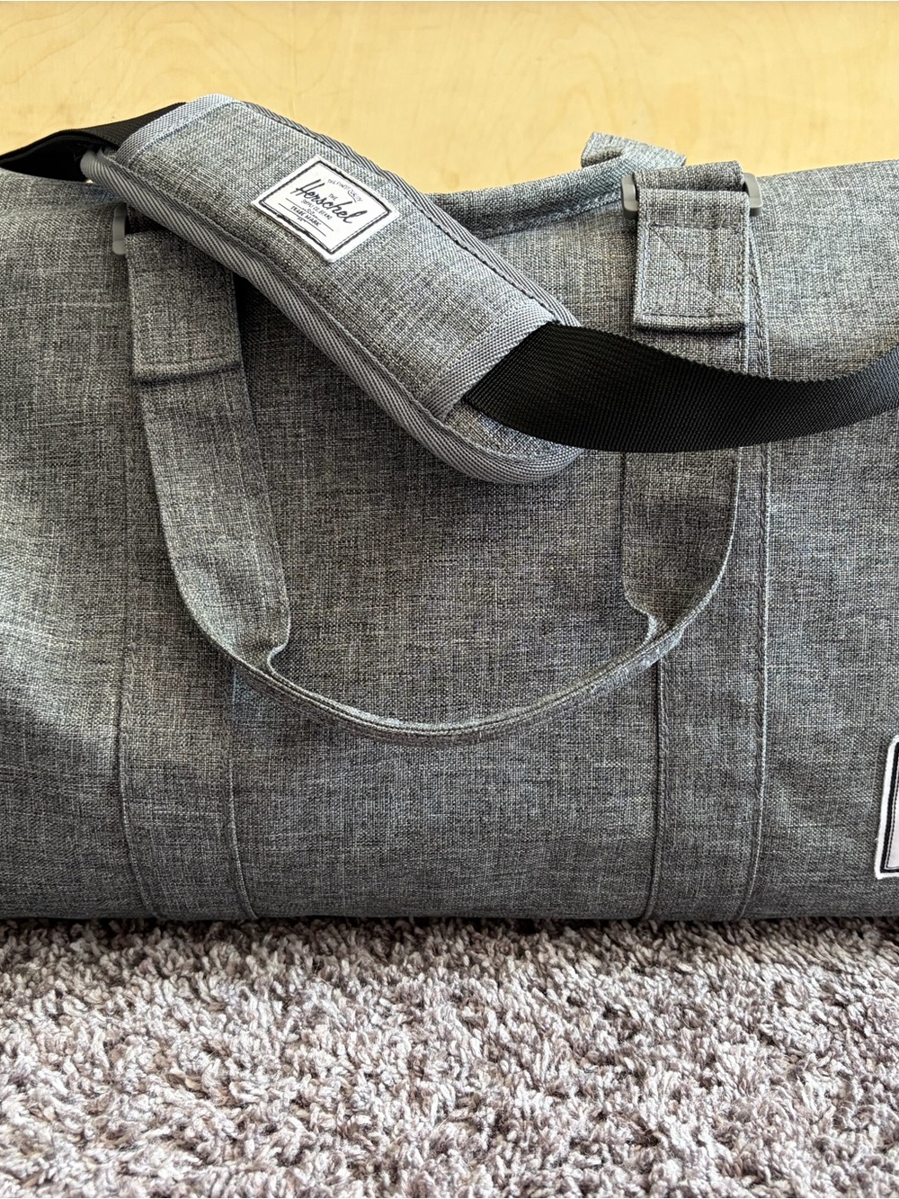 Herschel Supply Co. Light Gray Canvas Duffel Bag with Black Strap